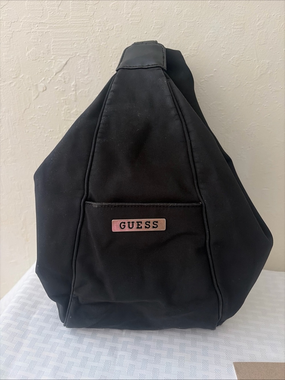 GUESS Black Sling Bag with Pink Logo Plate